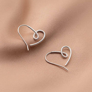 Love Twisted Hollow Design Heart Hoop Earrings