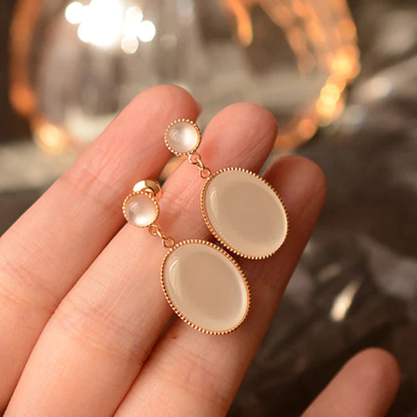 Cats eye stone earrings discount